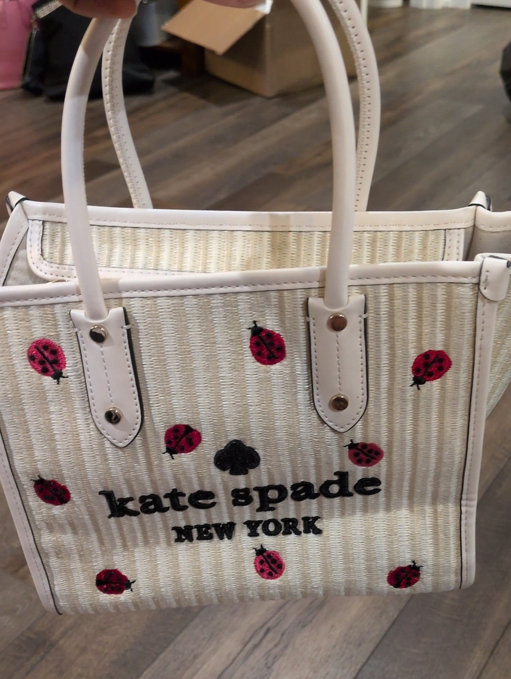 kate spade cream straw tote with pink ladybug embroidery